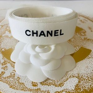 CHANEL  White With Black Embossed Lettering